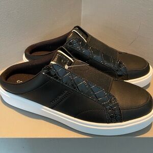 Black mule sneakers by COLE HAAN